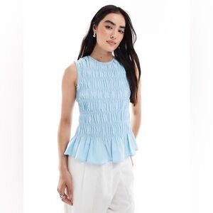 Elegant Sky Blue Sleeveless Blouse